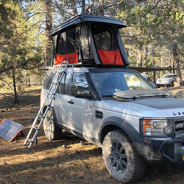 Badass Tents 2005-2016 Land Rover LR3  LR4  Discovery 3  Discovery 4 CONVOY Rooftop Tent Action Shot w Ladder