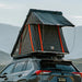 Badass Tents PACKOUT Clamshell Rooftop Tent Action Shot on RAV4 w Rainfly