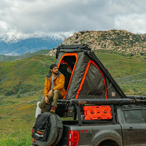 Badass Tents PACKOUT Clamshell Rooftop Tent Action Shot on Truck Camper