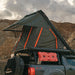 Badass Tents PACKOUT Clamshell Rooftop Tent Action Shot on Truck Side1